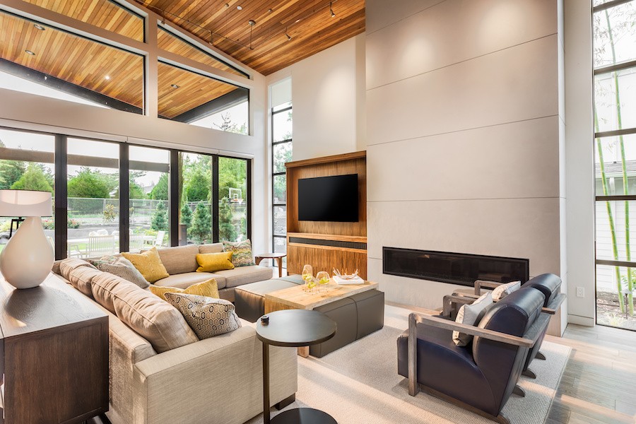 A modern bathroom living room with a wall-mounted TV. 