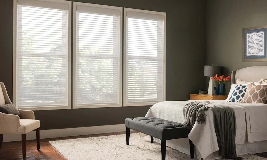 white horizontal sheer blinds in a bedroom